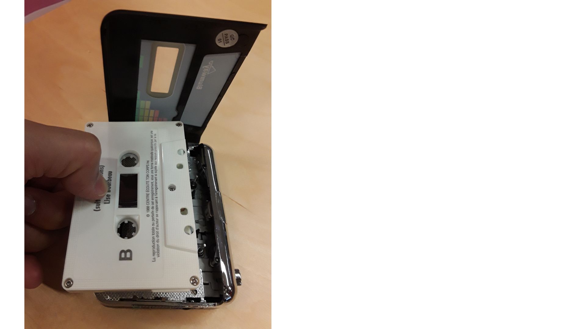 Insérez la cassette dans le magnétophone