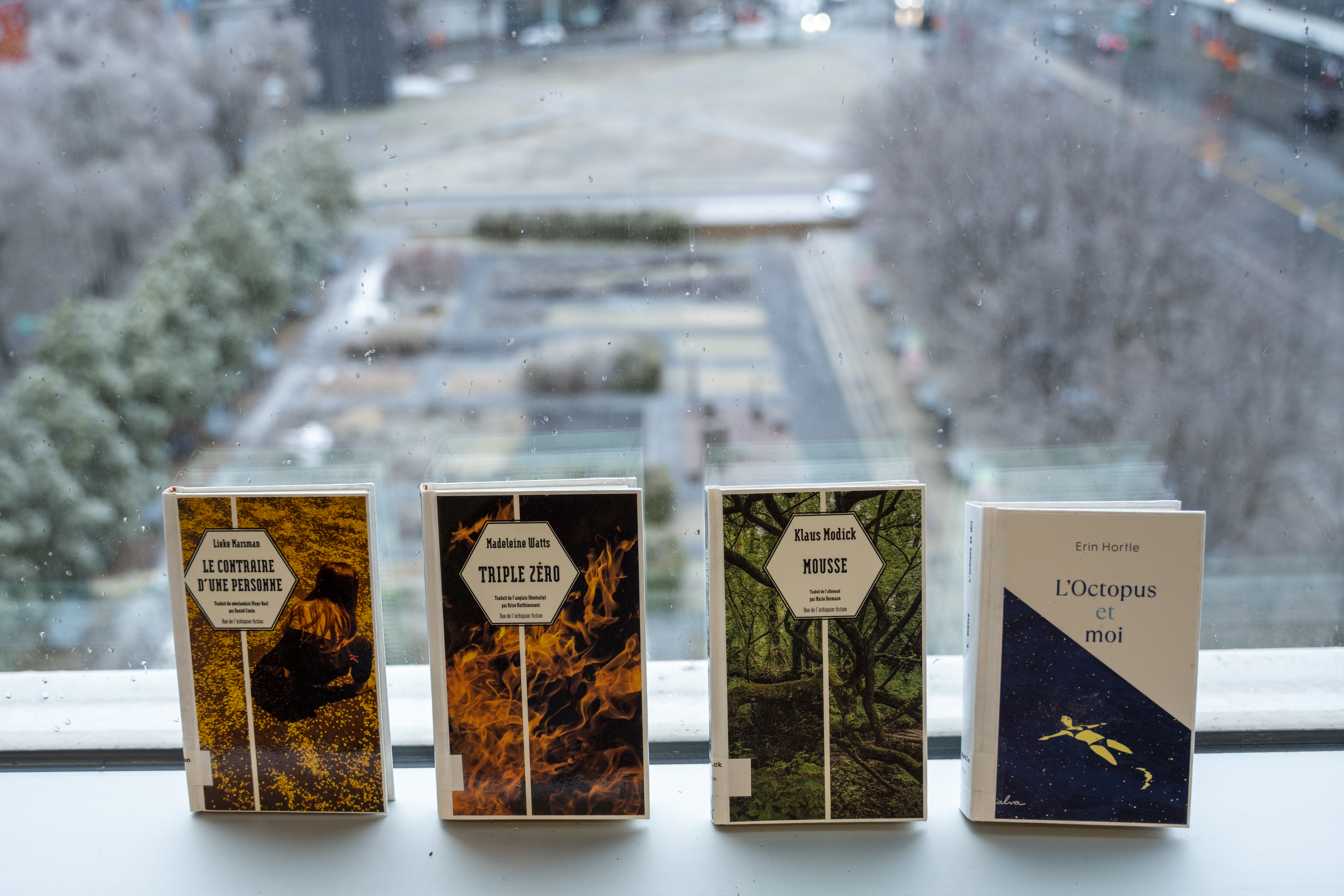 Les livres Le contraire d'une personne de Lieke Marsman, Triple zéro de Madeleine Watts, Mousse de Klaus Modick et L'octopus et moi d'Erin Hortle