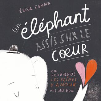 Un éléphant blanc qui tient un cœur avec la trompe.